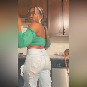 Size 3 ripped jeans, ripped on the front and back.